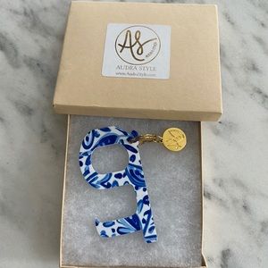 Button pusher, door opener